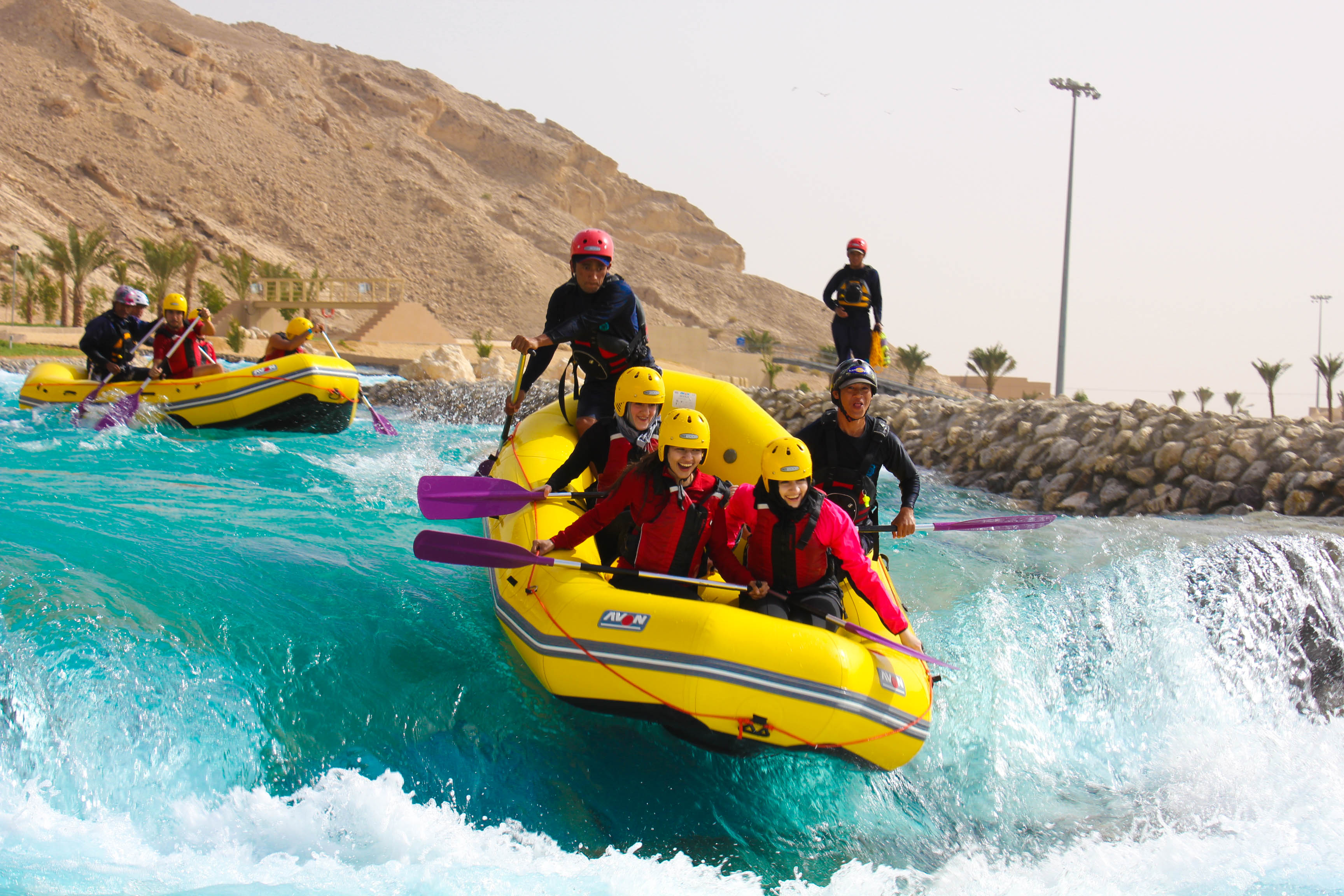 Group white-water rafting through rapids