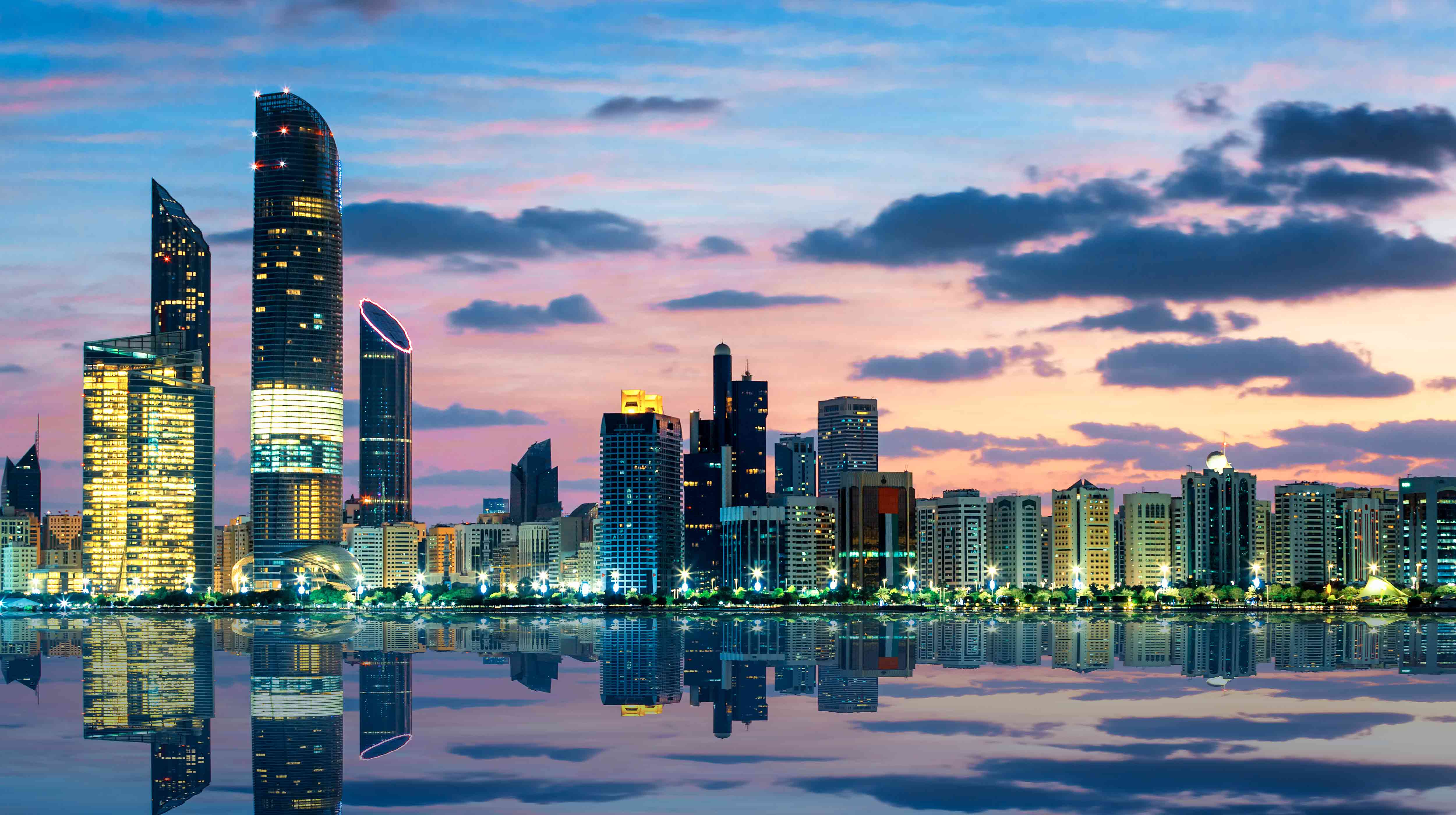 Twinkling view of the Abu Dhabi buildings at dusk