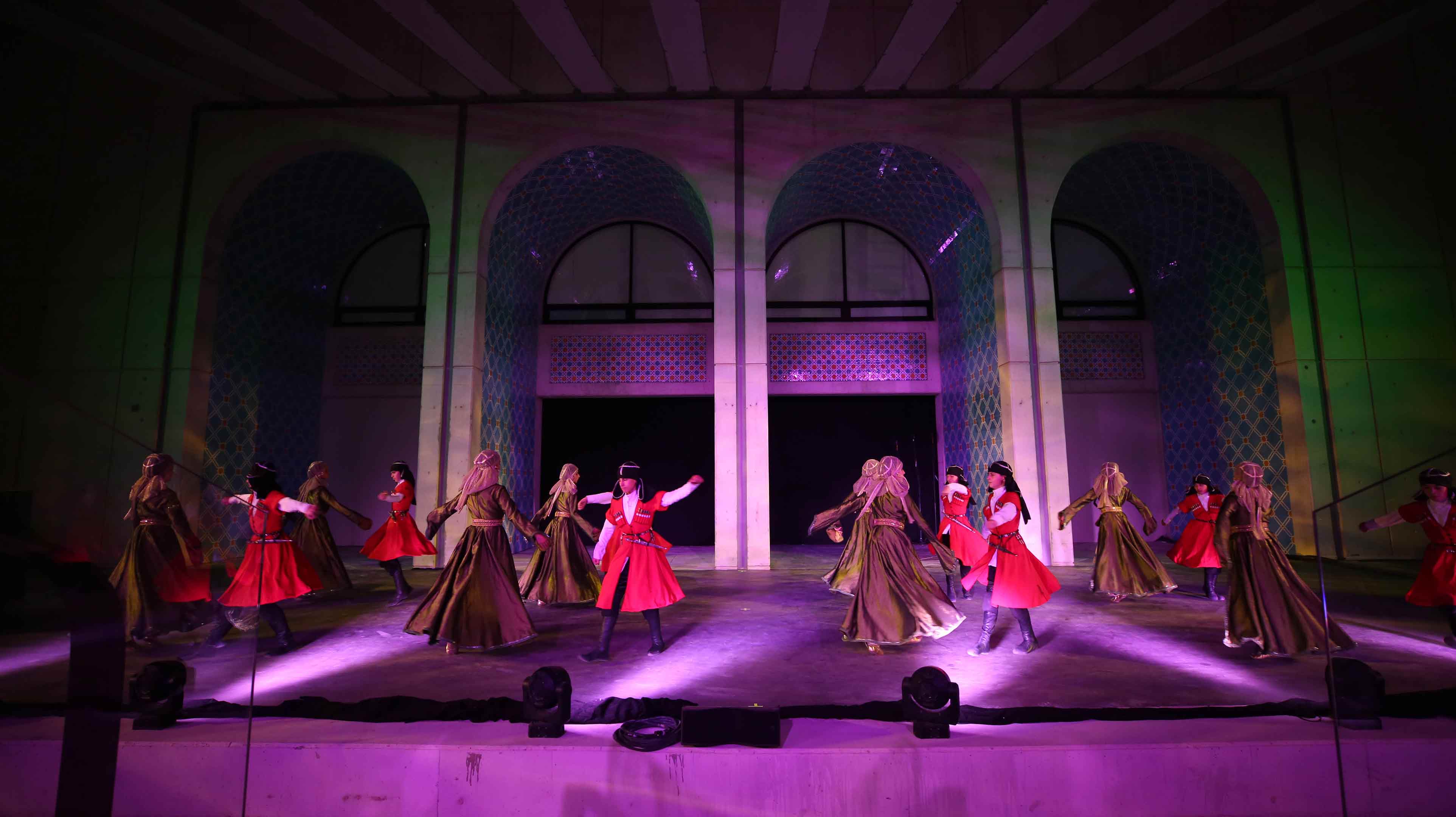 Dancers conducting a traditional dance at the Cultural Foundation