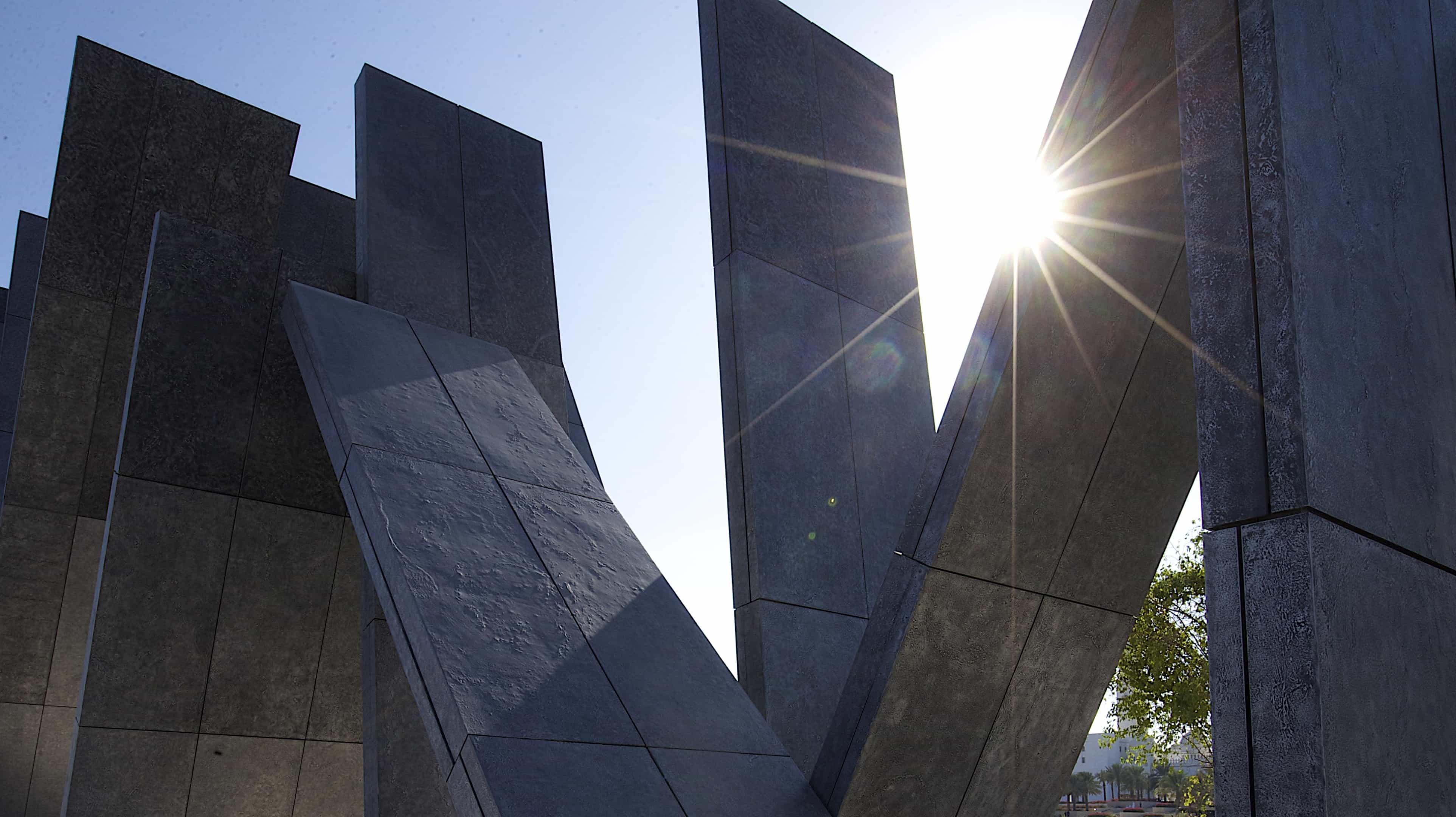 An imposing public art structure made up of 31 massive leaning tablets clad in aluminium, the symbolism behind the Memorial is clear