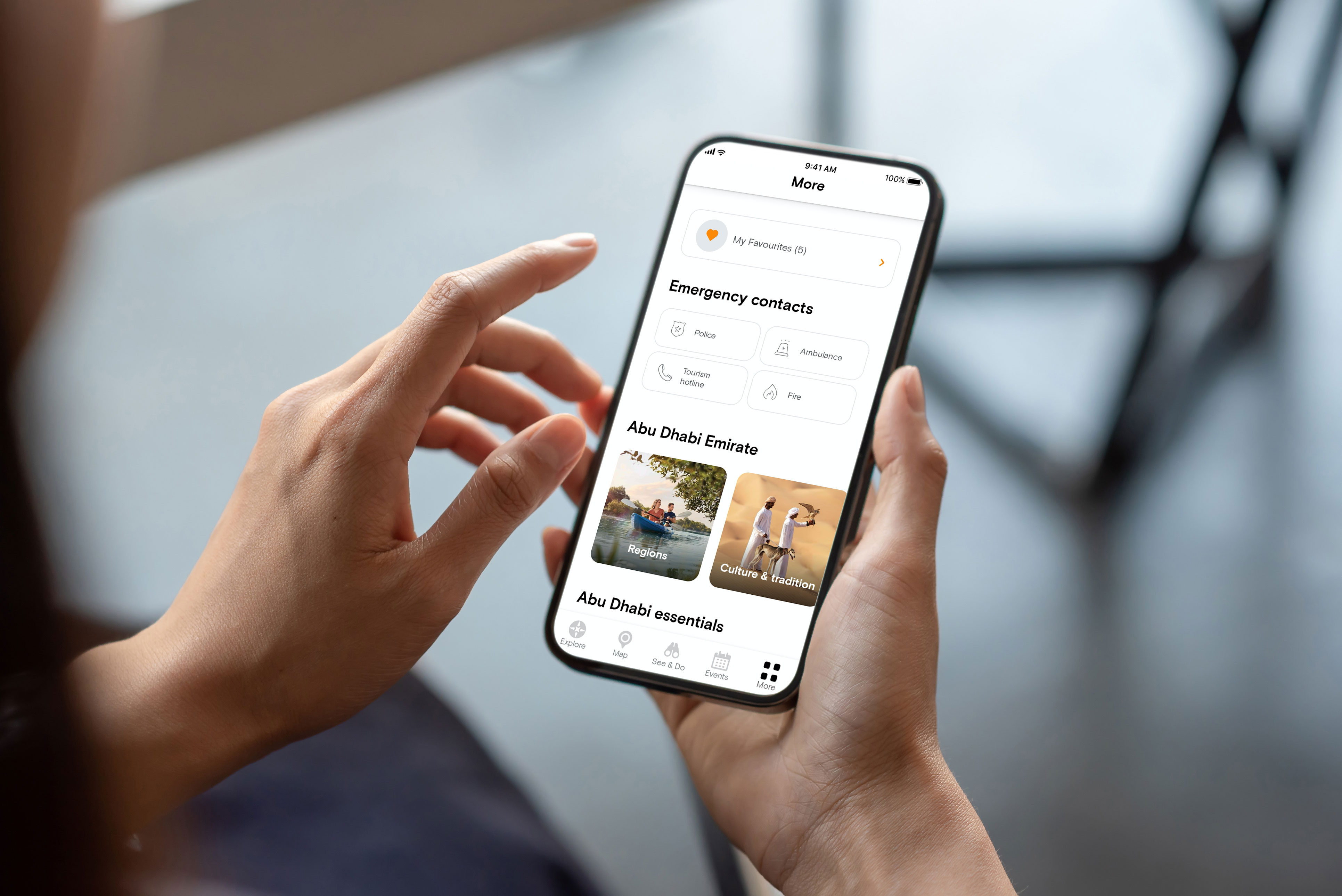 Woman using Emergency contact information on the Experience Abu Dhabi app