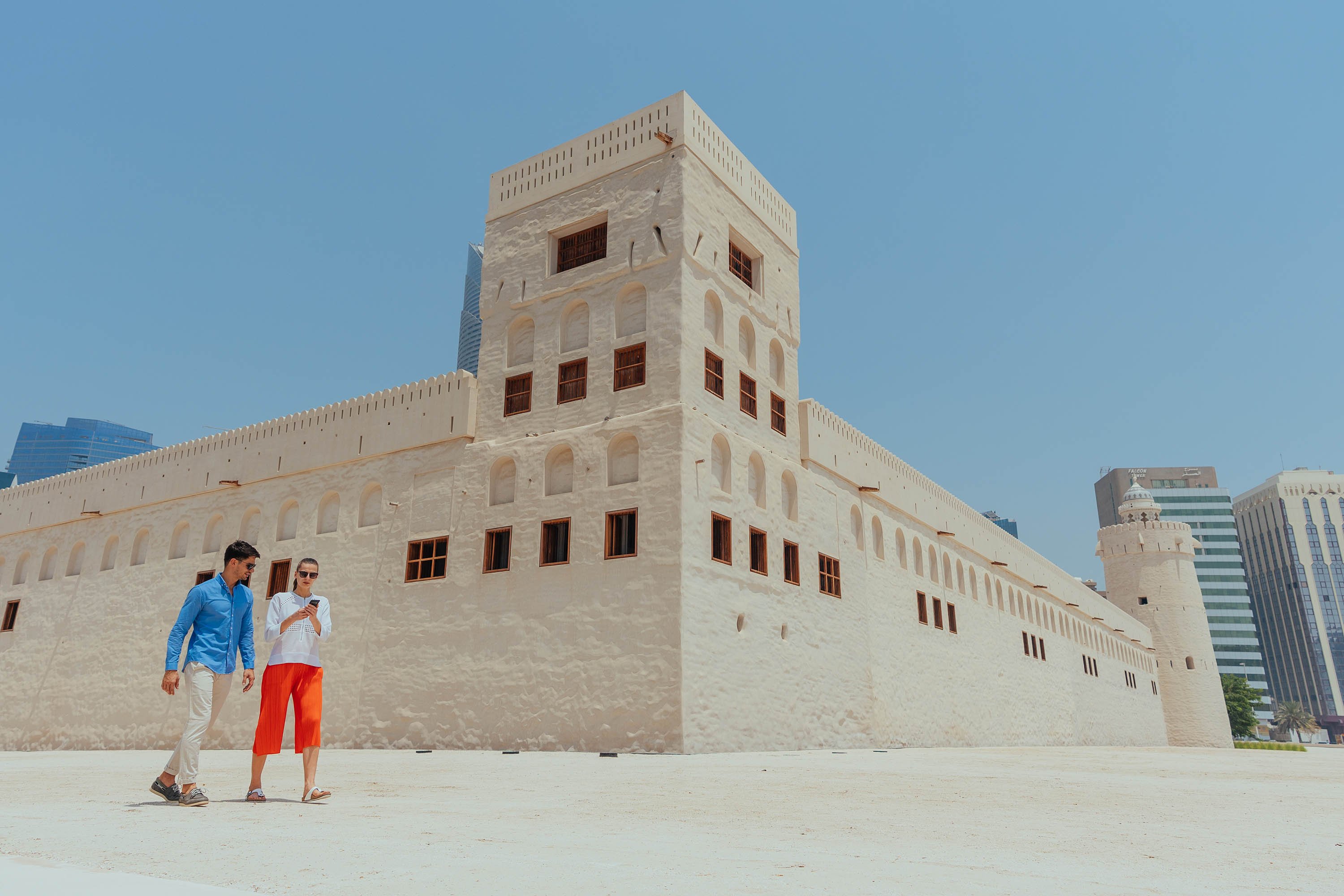 Couple exploring a stone fort on a free walking tour